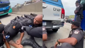 Recrutas da PM se abrigam durante tiroteio na Avenida Brasil